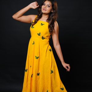 Yellow frock with butterfly embroidery